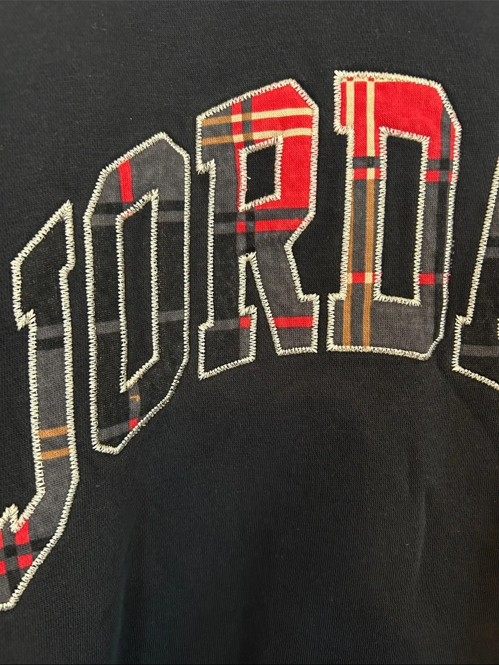 Jordan Black Crewneck Sweatshirt with Red Plaid Logo